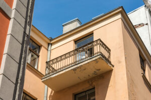 Look at old balcony. Europe.